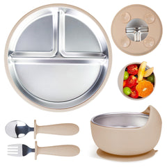 Momera stainless steel baby plate with suction base staying put on a flat table.