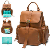 MOMINSIDE diaper bag backpack front view shows the leather exterior and spacious organization for on-the-go parents.