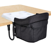 Mommyhug portable hook-on high chair with tray setup for travel meals.