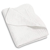 MONOBLANKS baby quilt with scalloped trim detail for nursery decor and warmth
