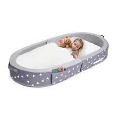 Mooedcoe toddler travel bed folded for compact storage and easy portability.
