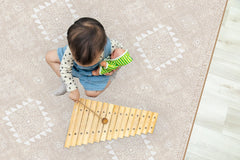 Moon Walkers Moon Mist play mat laid out indoors for tummy time practice