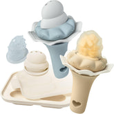 Moonkie baby fruit feeder with two pouches showing controlled flow for safer self-feeding