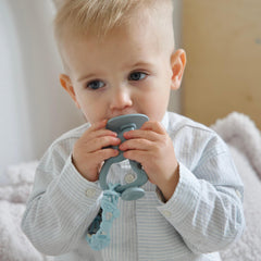 Moonkie Koala Warm Taupe teether with suction base for upright drying