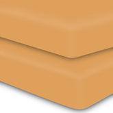 MOONQUEEN 2-pack crib sheets neatly folded for easy nursery organization.