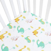 Moonsea dinosaur crib sheet on mattress offers secure fit for standard cribs.