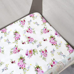 Moonsea Pack and Play Sheets floral pattern on playard showing Graco compatibility