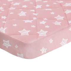 Moonsea quilted cushioning on pack n play sheet provides gentle support during playtime.