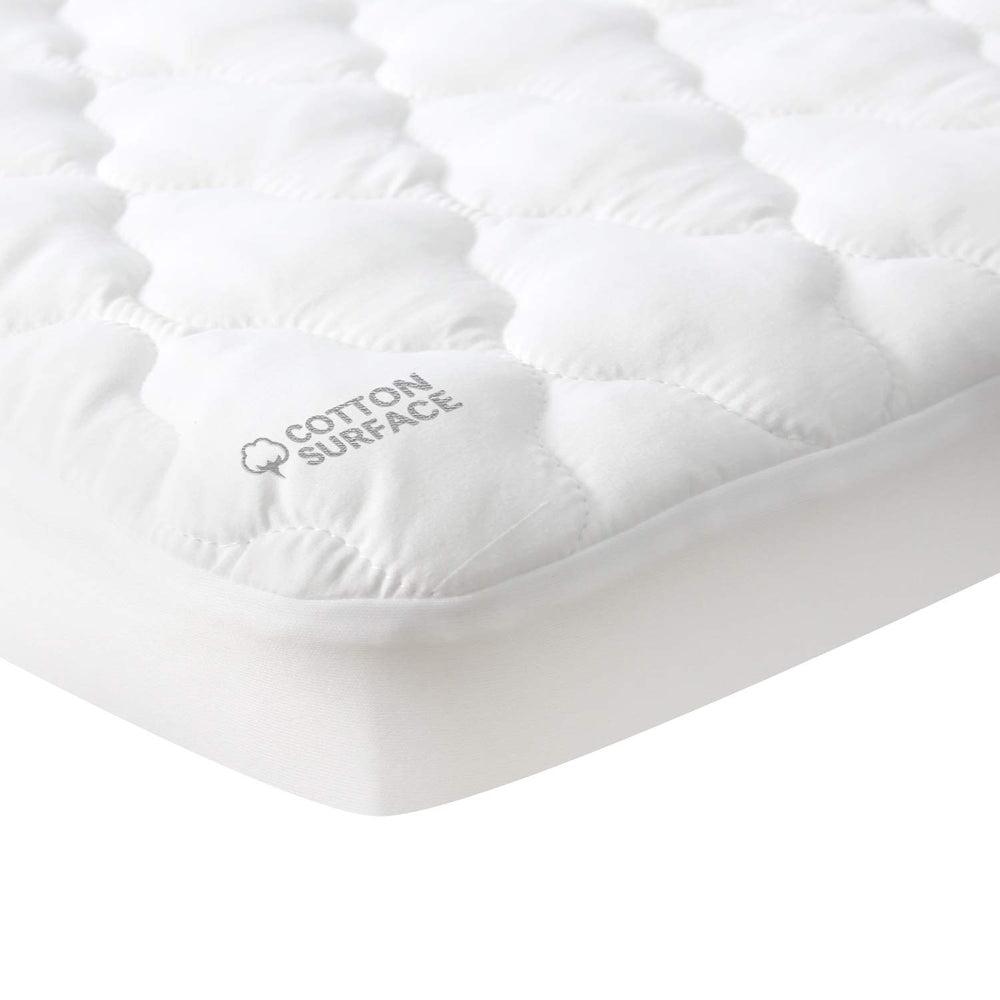 Moonsea waterproof pack-and-play mattress pad cover closeup reveals skin-friendly cotton surface for gentle baby skin.