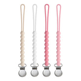MORIBOX pacifier clip beige keeps pacifier within reach and clean for busy babies.