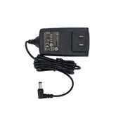 Motif Medical 12V power adapter connects to Luna pump for reliable travel charging.