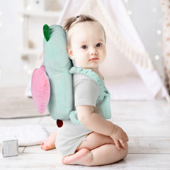 Mounting UP adjustable chest-strap on toddler for secure fit.