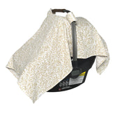 MOZAH Baby Car Seat Cover beige leaves folded—breathable muslin for comfy travel