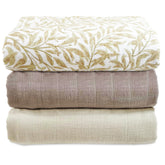 Mozah muslin swaddle brown: breathable, cozy newborn comfort for day and night use.