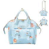 Mozzilog small diaper bag crossbody in sky blue animal print for easy on-the-go parenting.