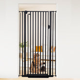 Mudanku 59-inch extra tall gate in doorway provides sturdy pet containment.