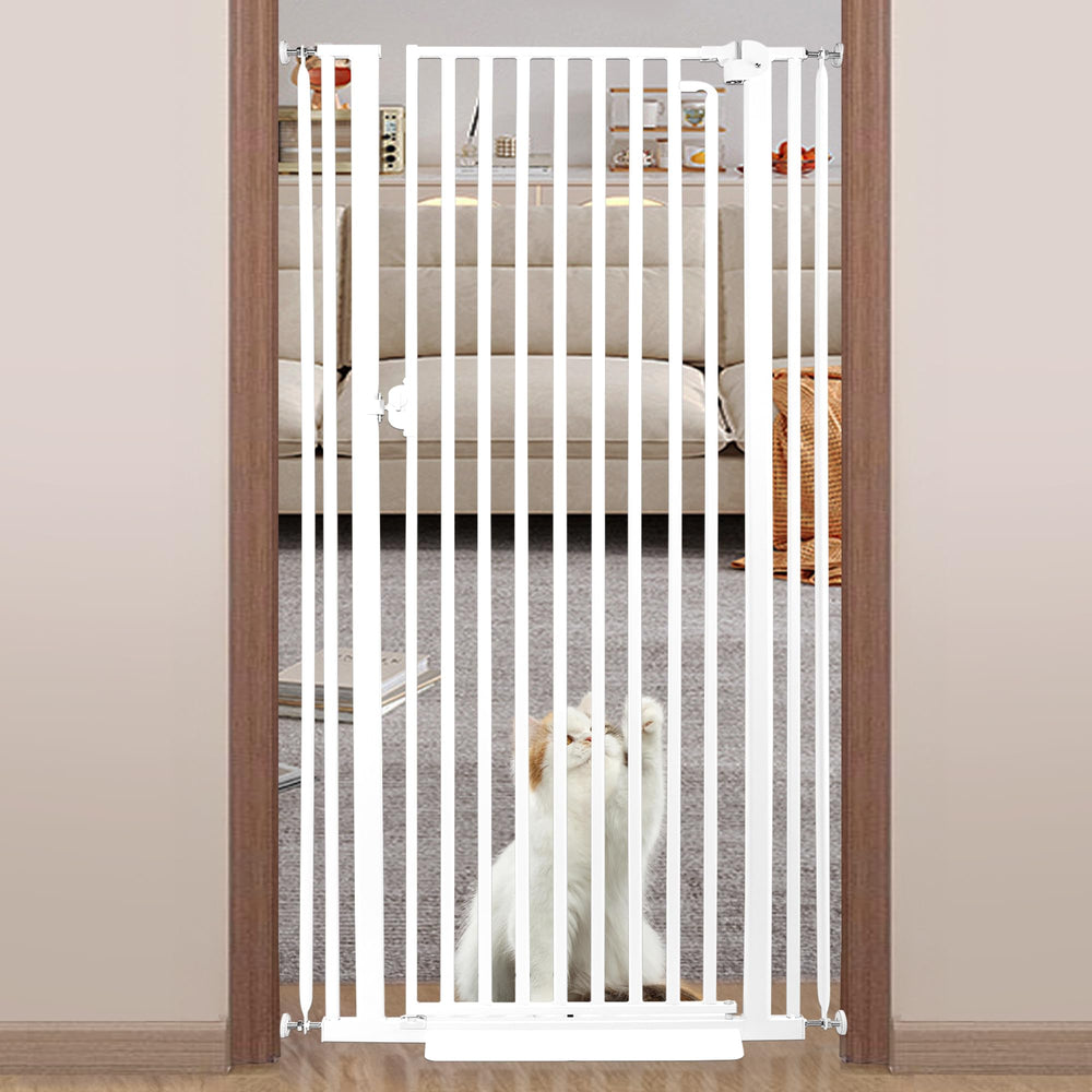 Mudanku 71-inch extra tall cat gate closed across doorway for pet containment.