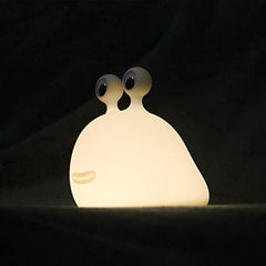 MUID slug night light close-up shows soft silicone texture for safe nighttime lighting in nurseries