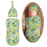 Muishi flowers with lemon swaddle blanket closeup highlights soft, skin-friendly fabric.