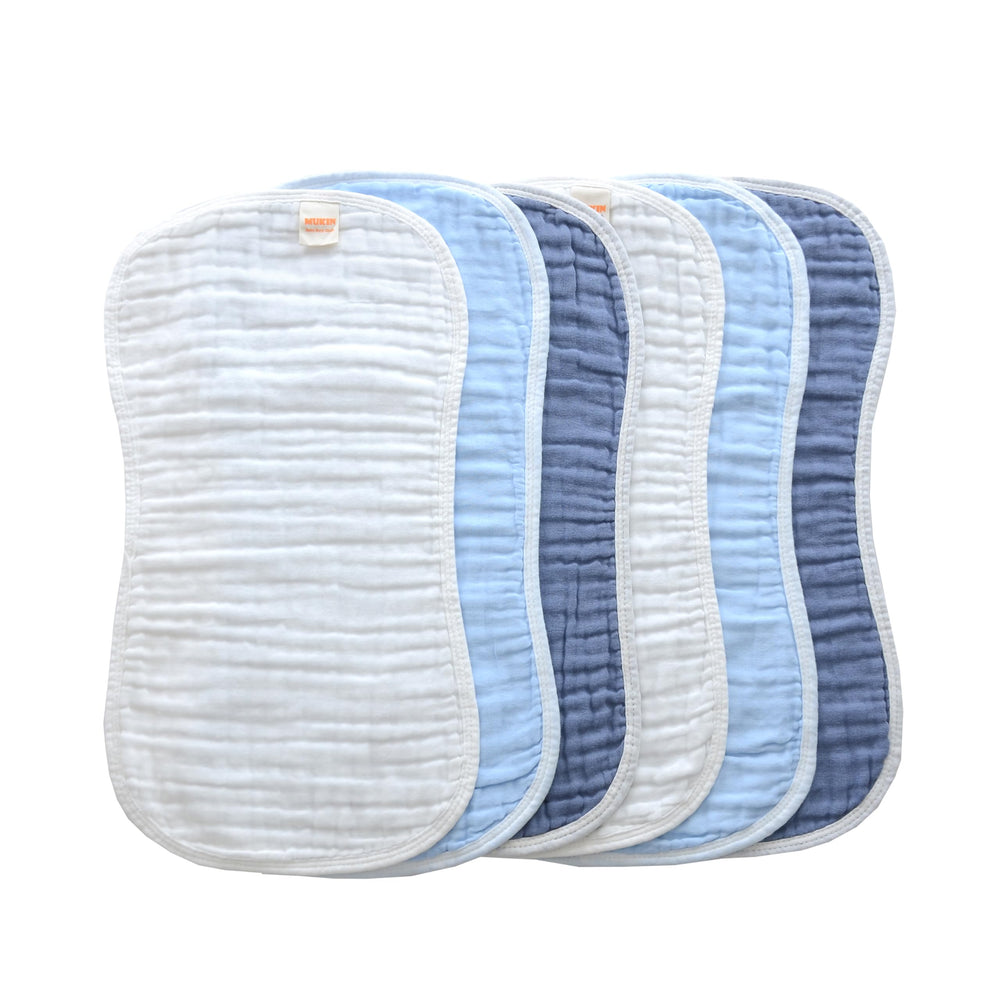 MUKIN baby burp cloths laid flat showing soft, absorbent 6-layer muslin for spit-up protection.
