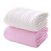 MUKIN baby towels close-up shows ultra-soft cotton touch for delicate skin.