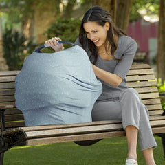 Munchkin Milkmakers shopping-cart cover protects against germs while baby sits.