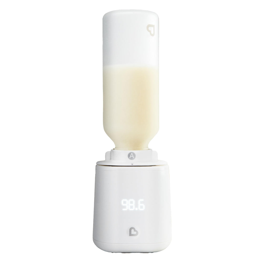 Munchkin Simple Touch Bottle Warmer base: compact platform for stable, mess-free heating.