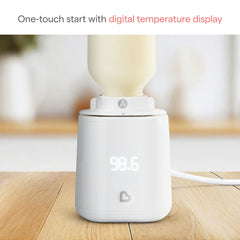 Munchkin Simple Touch Bottle Warmer leak-proof design prevents spills during mid-feed sessions.