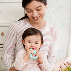 Munchkin Two-in-One Teether Spoon β dual function to ease early feeding and teething.