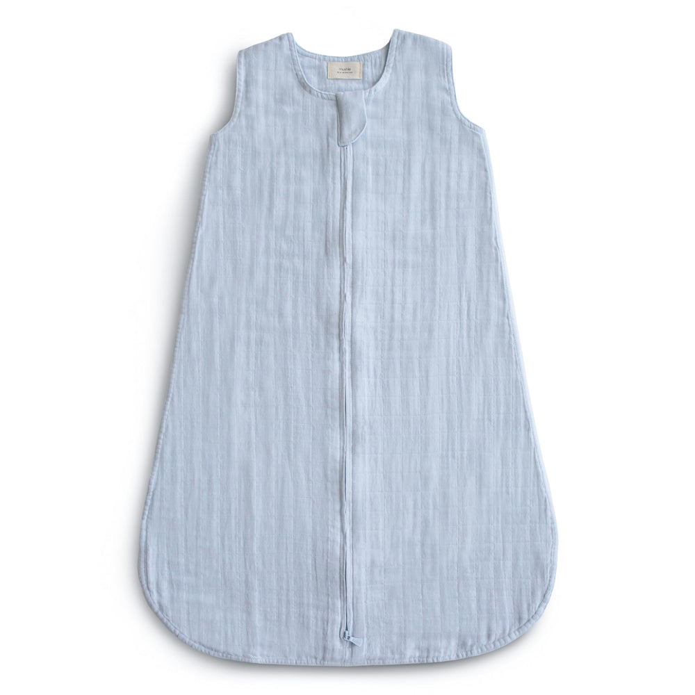 Mushie baby wearable blanket front view in baby blue promotes cozy, secure sleep