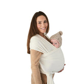 Mushie baby wrap Ivory close-up shows soft cotton for gentle skin contact.