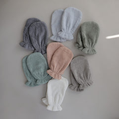 Mushie bath mitt with elastic cuff design for secure fit