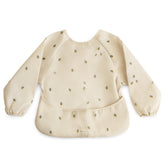 Mushie Bees long sleeve bib front view with water-resistant fabric for quick spill cleanup.