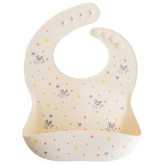 Mushie Bluey bib adjustable neck strap offers snug comfort during meals.