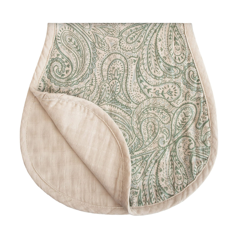 Mushie burp cloth in green paisley pattern for everyday feeding messes.