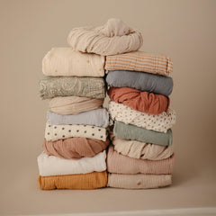 Mushie crib sheet with deep pockets keeps mattress snug after washes