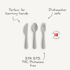 Mushie cutlery set sage spoon close-up highlights comfortable grip for toddler meals.