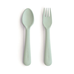 Mushie flatware fork in Sage designed for easy toddler grip and independent eating.