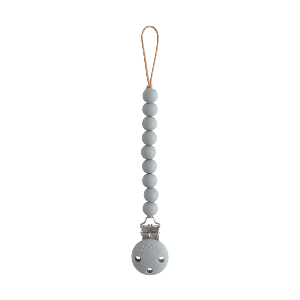Mushie Hera stone pacifier clip closeup shows screwless clasp for safe use