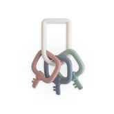 mushie Key Toy closeup in soothing colors for calming sensory play.