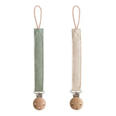 Mushie linen pacifier clip olive closeup with soft fabric for on-the-go comfort