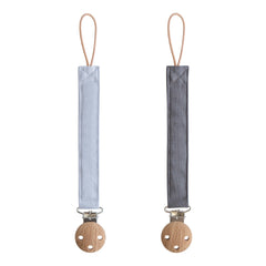 Mushie Linen Pacifier Clip Strap Powder Blue shows soft fabric and easy-on-the-go security