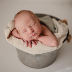 Mushie Muslin Cloth Fog changing-table-use demonstrates gentle layer for diaper changes