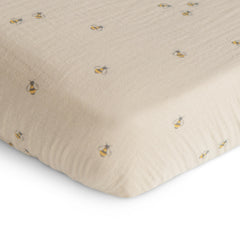 Mushie muslin fabric close-up shows plush texture gentle on baby skin.
