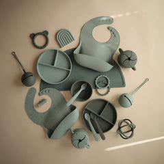 Mushie pacifier holder case stores two pacifiers for on the go