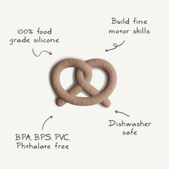 Mushie pretzel teether baby grip demo highlights easy grasp for little hands.