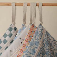 Mushie wet bags with zipper closure for secure contents
