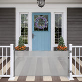 MYPIN retractable gate in a wide doorway for versatile indoor and outdoor use.