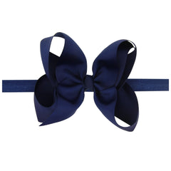 NaFurAhi LD DRESS navy bow closeup showing heat-sealed ribbons