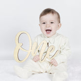 NaFurAhi noxozoqm first birthday front view sign boosts photo shoot clarity and charm